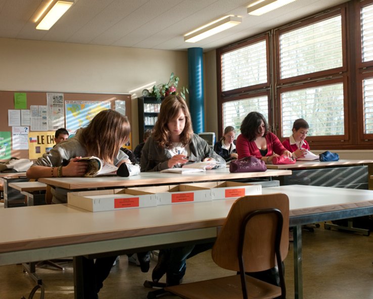 Elèves dans une salle de classe - Photo: Yves Leresche