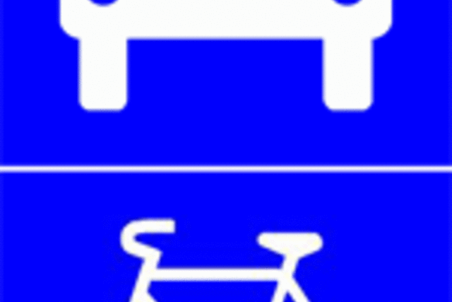 symboles routiers semi-autoroute et vélo superposés