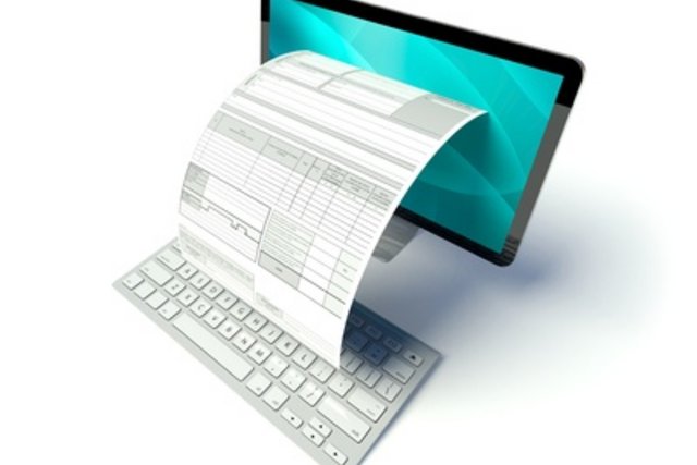 Image d'illustration: un formulaire sort de l'écran d'un laptop.