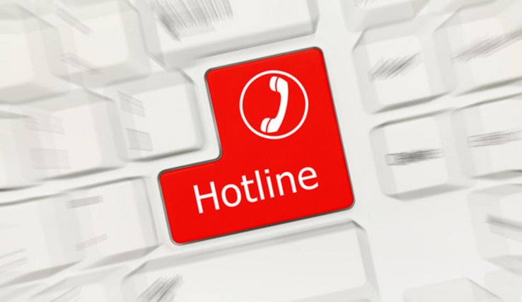 illustration: mot "hotline" inscrit sur une touche de clavier d'ordinateur.