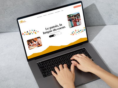 Image illustrative d'un ordinateur avec la page principale Patoisromands.ch sur l'écran