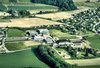 Le gymnase en 1983 avec l'ajout de l'Ecole normale et salle de sport