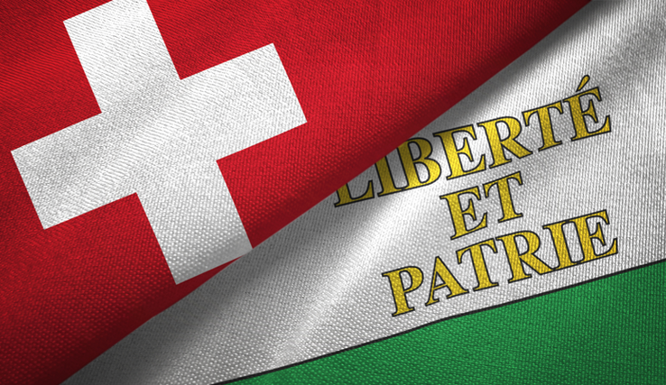 le drapeau suisse et le drapeau vaudois juxtaposés